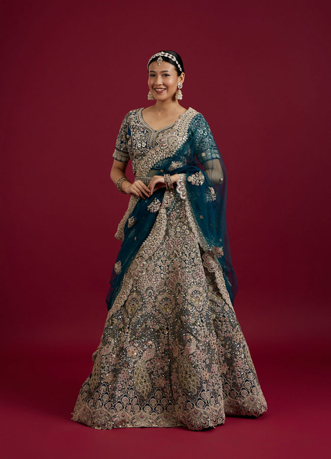 Mohey Women Teal Blue Sequinned Lehenga with Jaal Pattern And Peacock Motifs