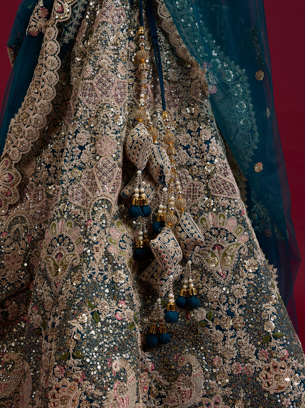 Mohey Women Teal Blue Sequinned Lehenga with Jaal Pattern And Peacock Motifs