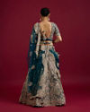 Mohey Women Teal Blue Sequinned Lehenga with Jaal Pattern And Peacock Motifs