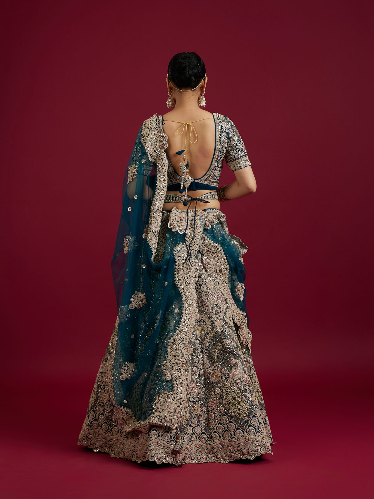 Mohey Women Teal Blue Sequinned Lehenga with Jaal Pattern And Peacock Motifs