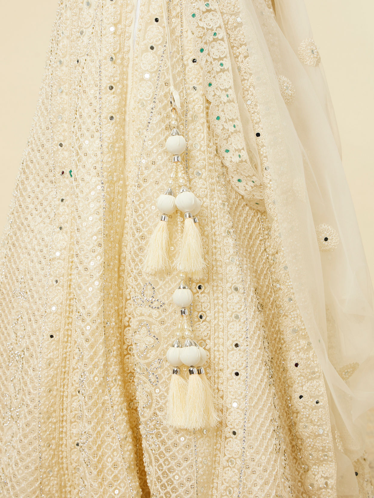 Mohey Women Dark Cream Floral Patterned Lehenga with Mirror work
