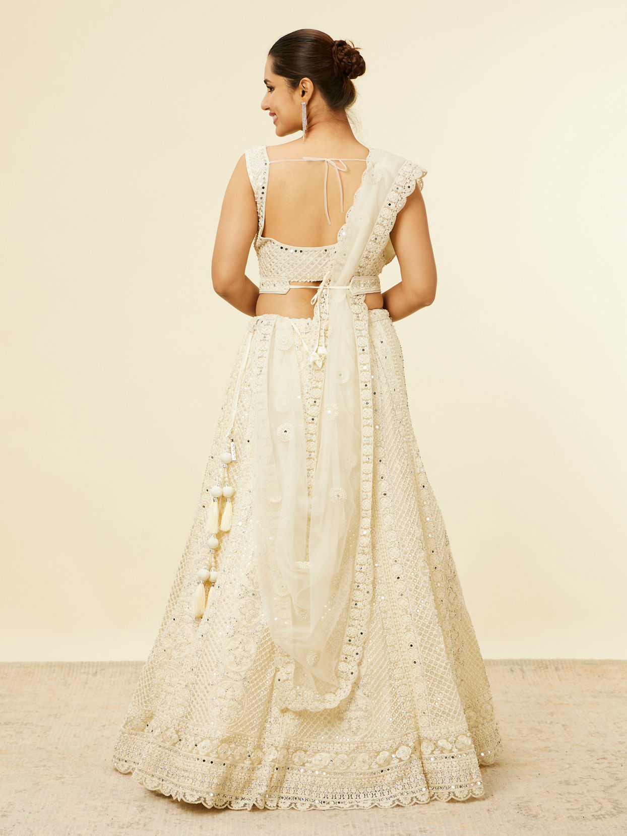 Mohey Women Dark Cream Floral Patterned Lehenga with Mirror work