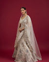 Mohey Women Beige Cream Sitara Embroidered Bridal Lehenga with Stone Work