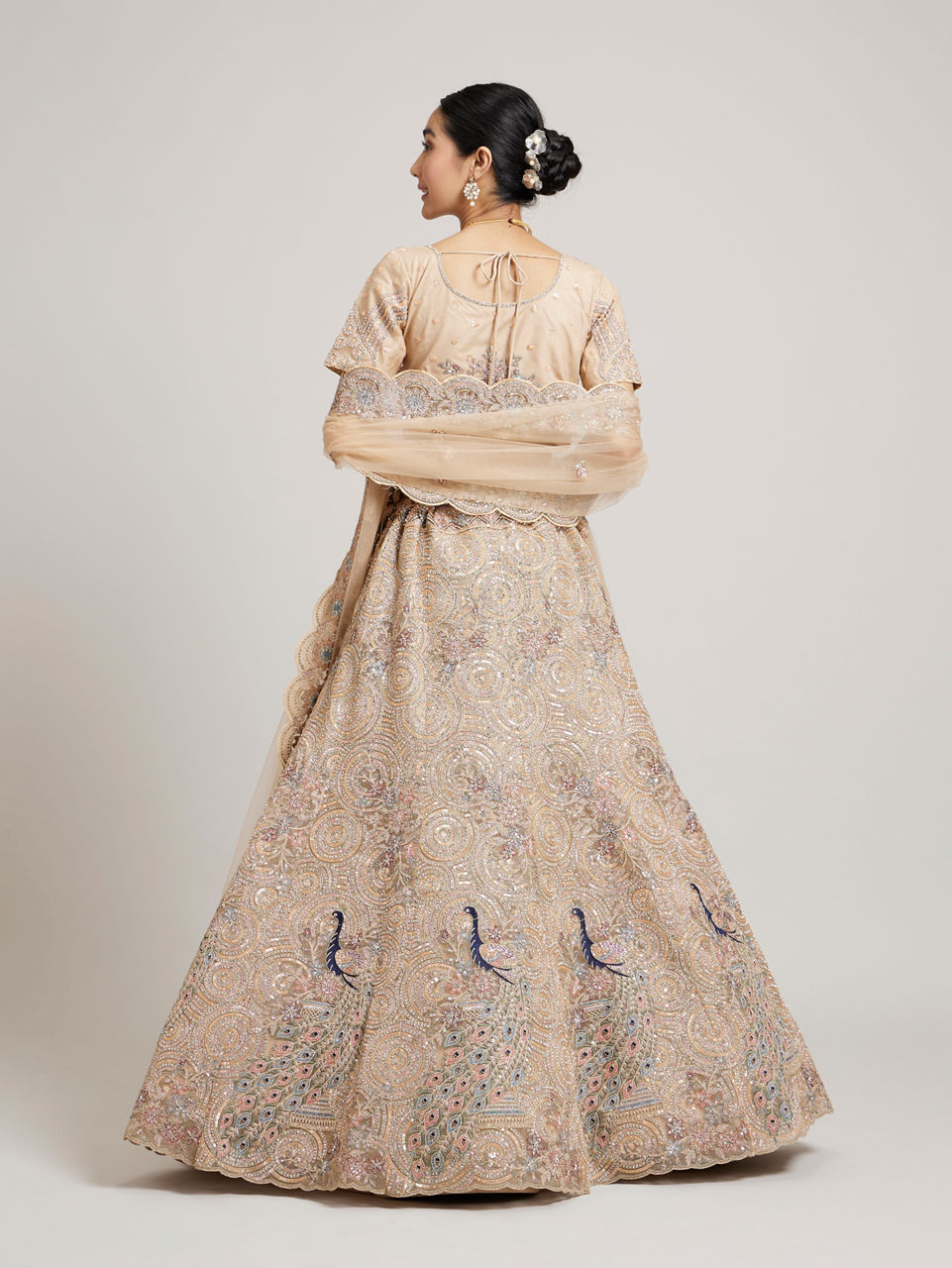 Mohey Women Soft Fawn Sitara Embroidered Lehenga with Peacock Motifs