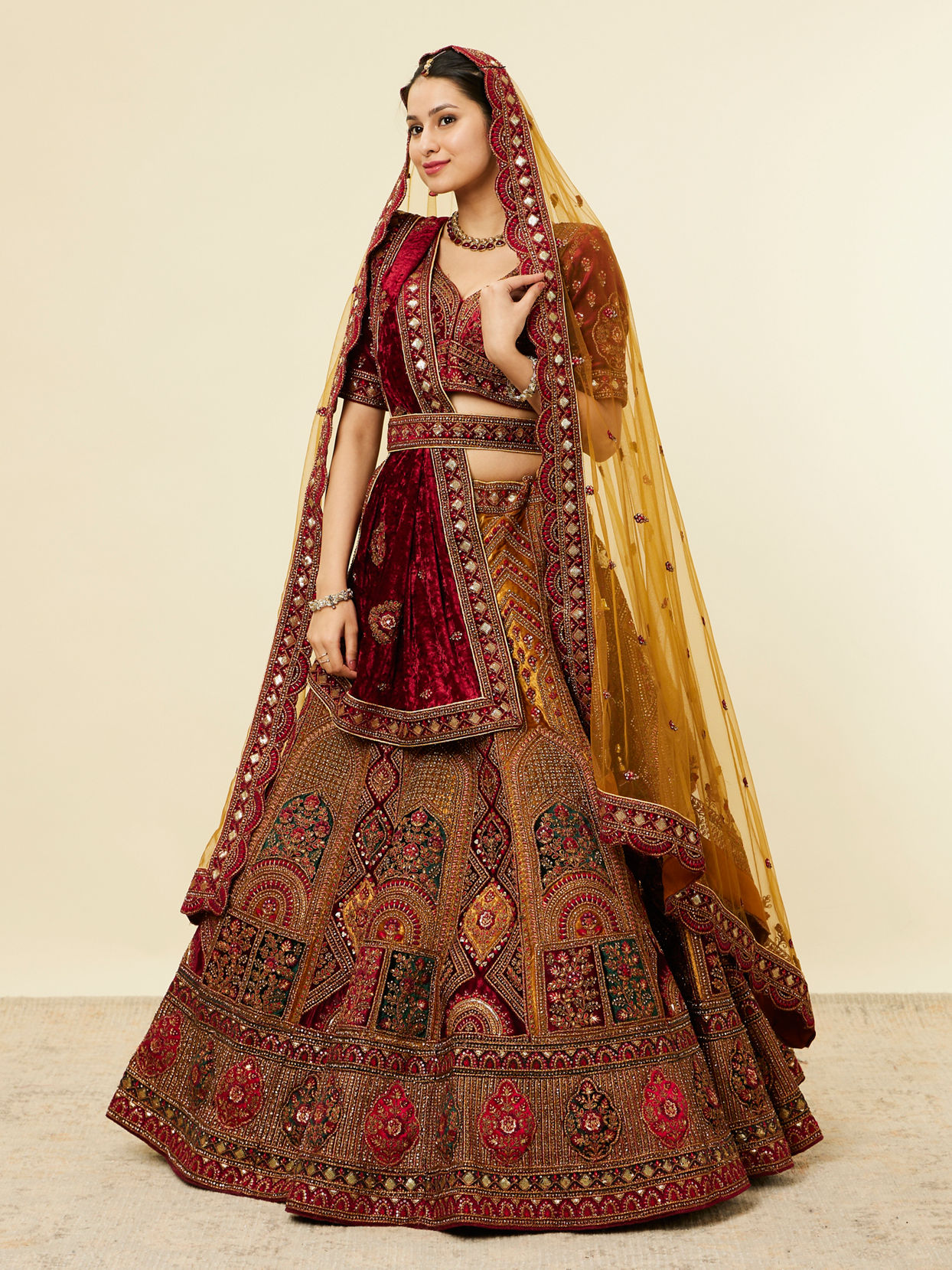 alt message - Mohey Women Mustard Yellow Maroon Buta Motif Lehenga image number 2