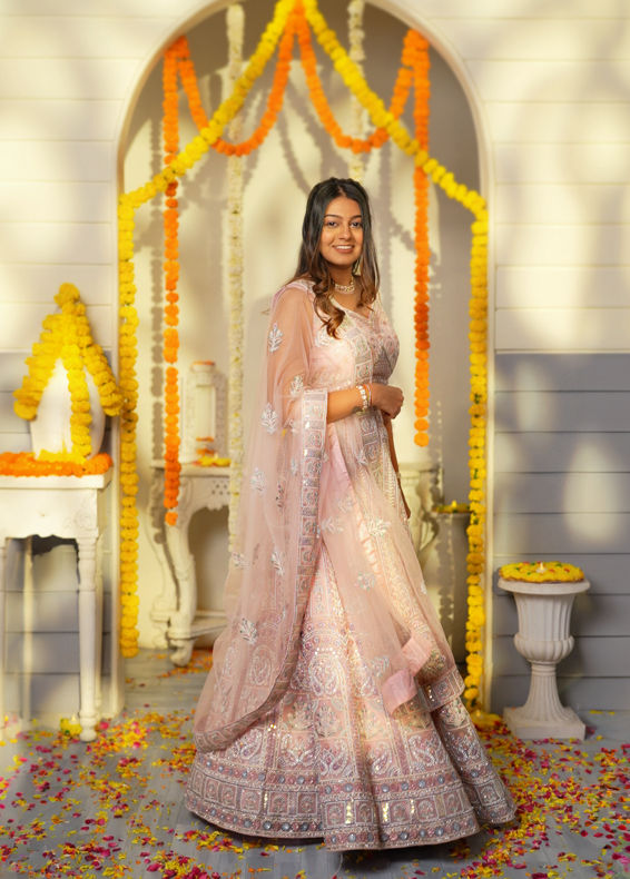 Mohey Women Carnation Pink Floral Embroidered Bridal Lehenga with Mirror Embellishments