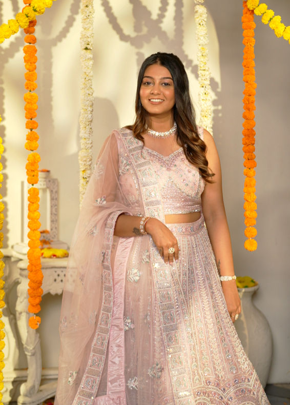 Mohey Women Carnation Pink Floral Embroidered Bridal Lehenga with Mirror Embellishments