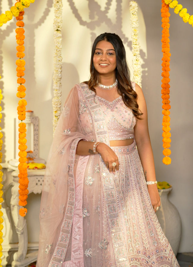 Mohey Women Carnation Pink Floral Embroidered Bridal Lehenga with Mirror Embellishments