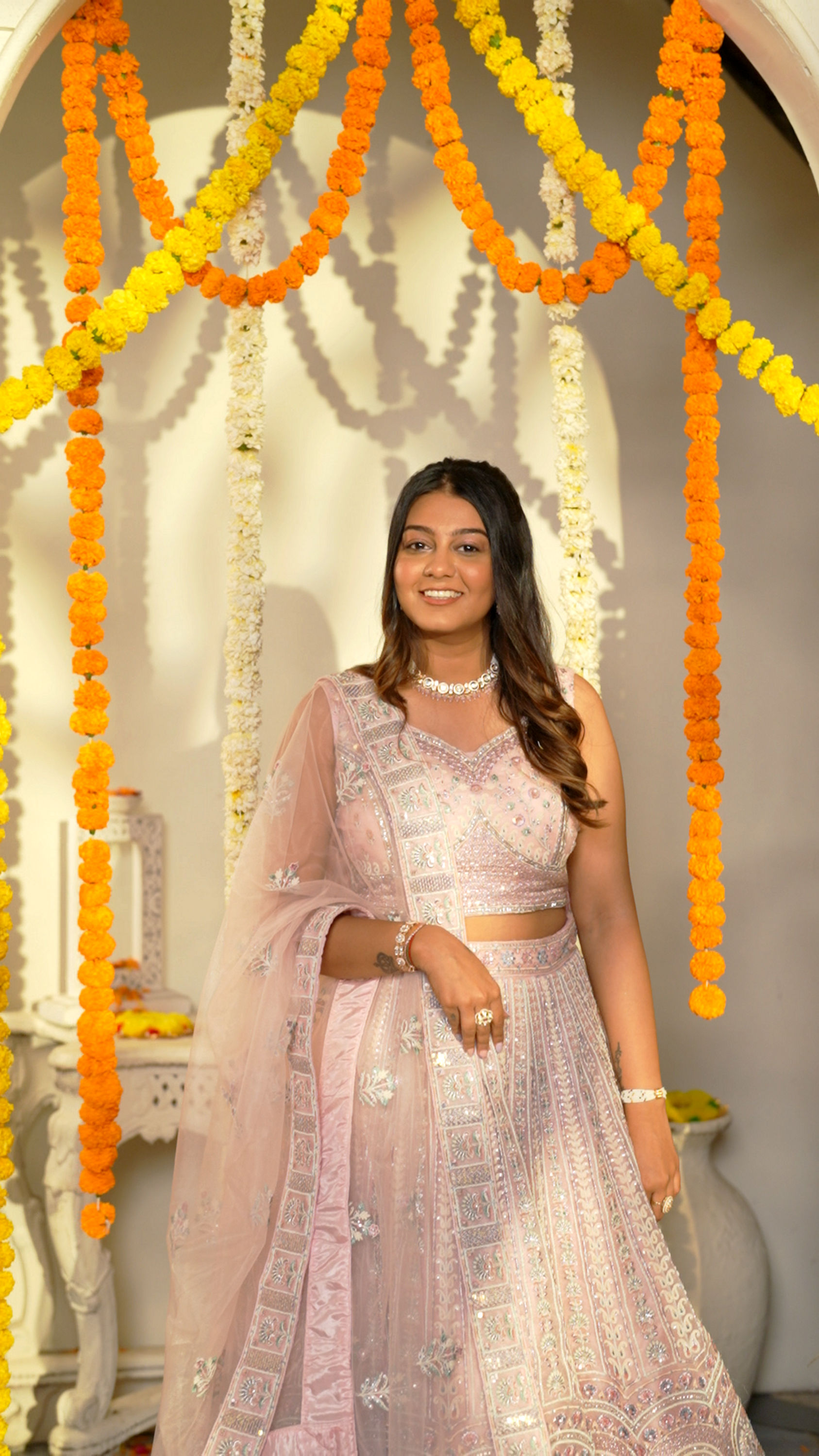 Mohey Women Carnation Pink Floral Embroidered Bridal Lehenga with Mirror Embellishments