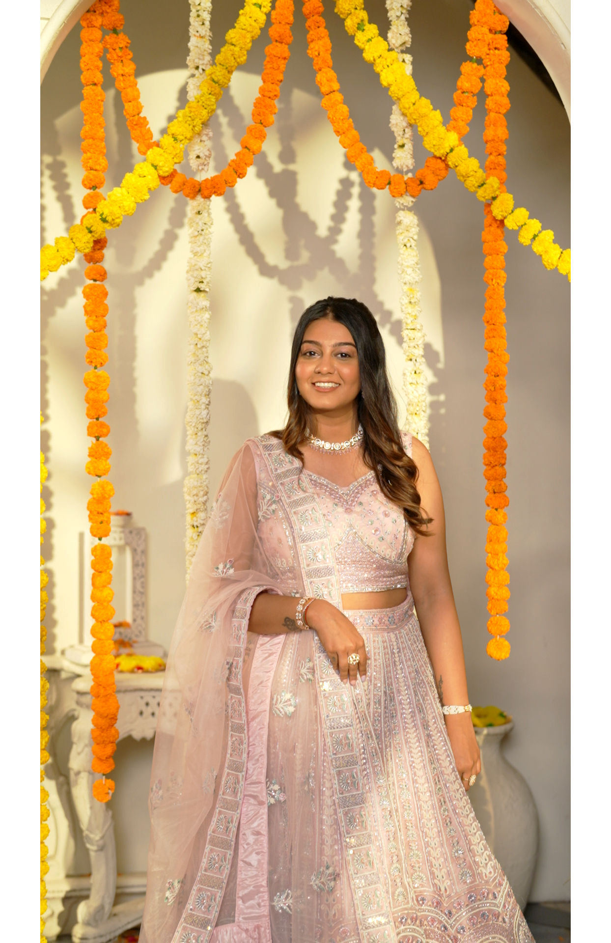 Mohey Women Carnation Pink Floral Embroidered Bridal Lehenga with Mirror Embellishments