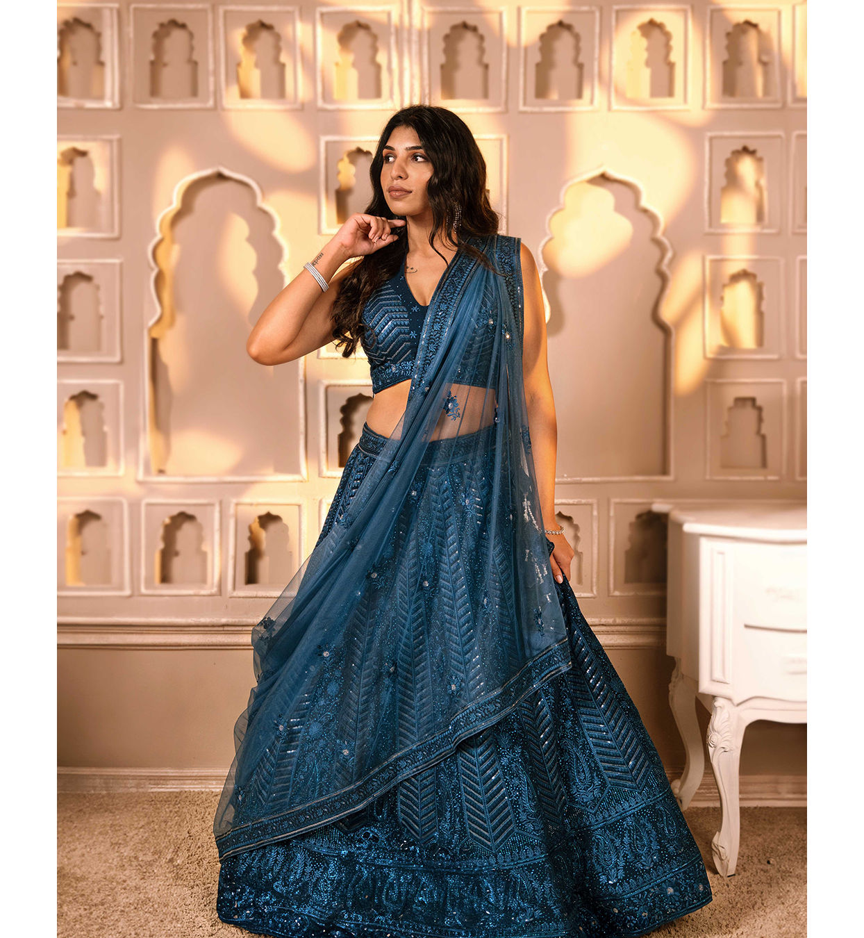 alt message - Mohey Women Teal Blue Floral and Chevron Patterned Lehenga image number 0