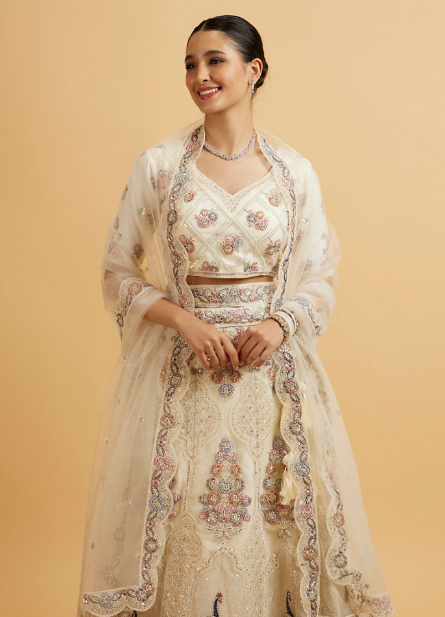 alt message - Mohey Women Beige Cream Sitara Embroidered Lehenga image number 1