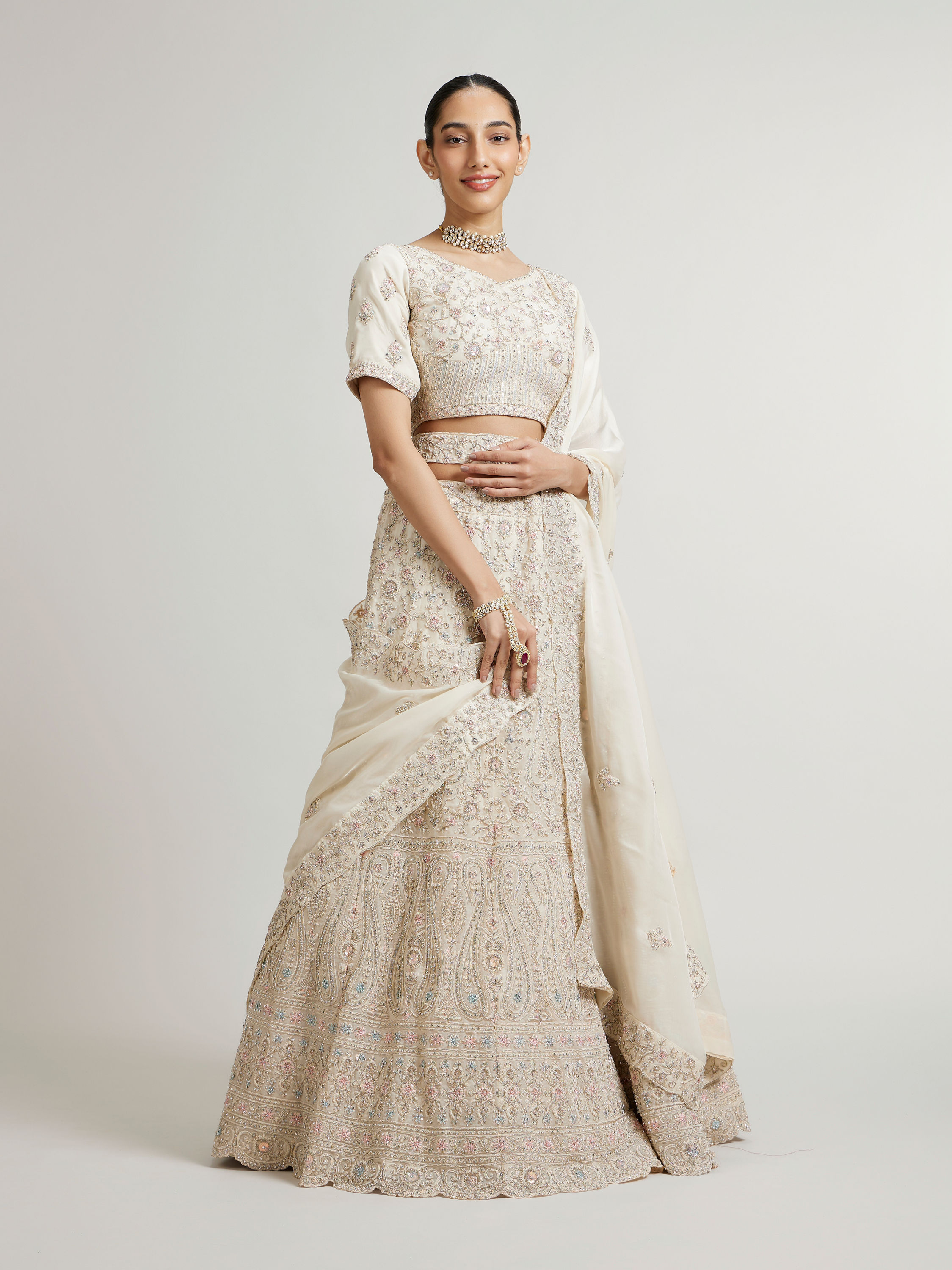 Mohey Women Cream White Paisley Lehenga with Sequin Work And Scalloped Hem