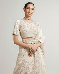 Mohey Women Cream White Paisley Lehenga with Sequin Work And Scalloped Hem