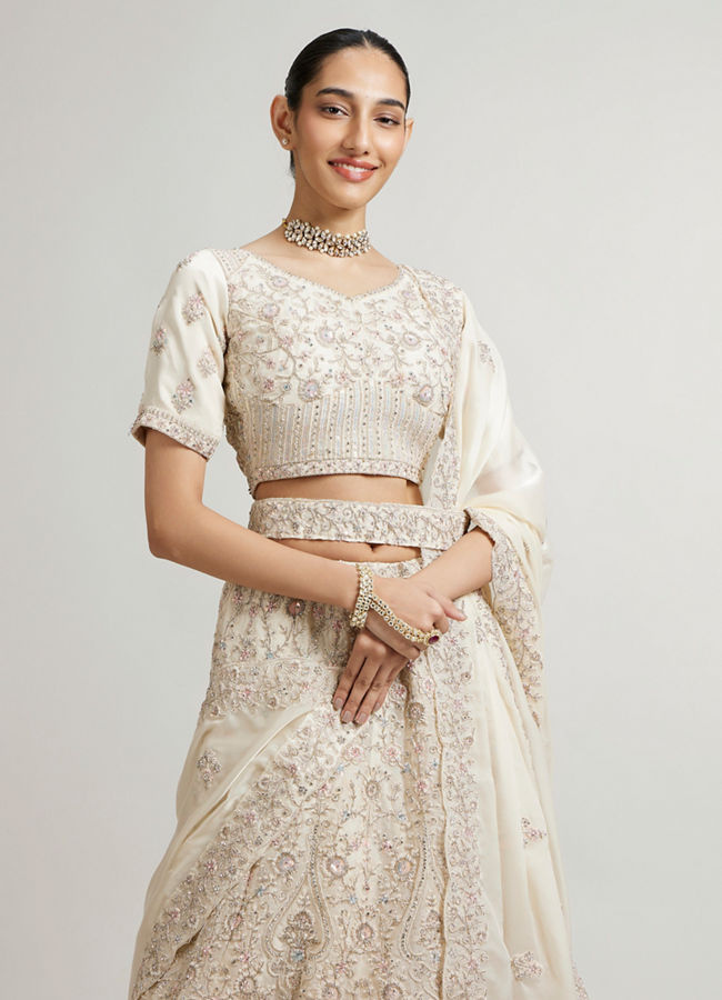 Mohey Women Cream White Paisley & Bel Buti Patterned Bridal Lehenga with Sequin Work & Scalloped Hem image number 1