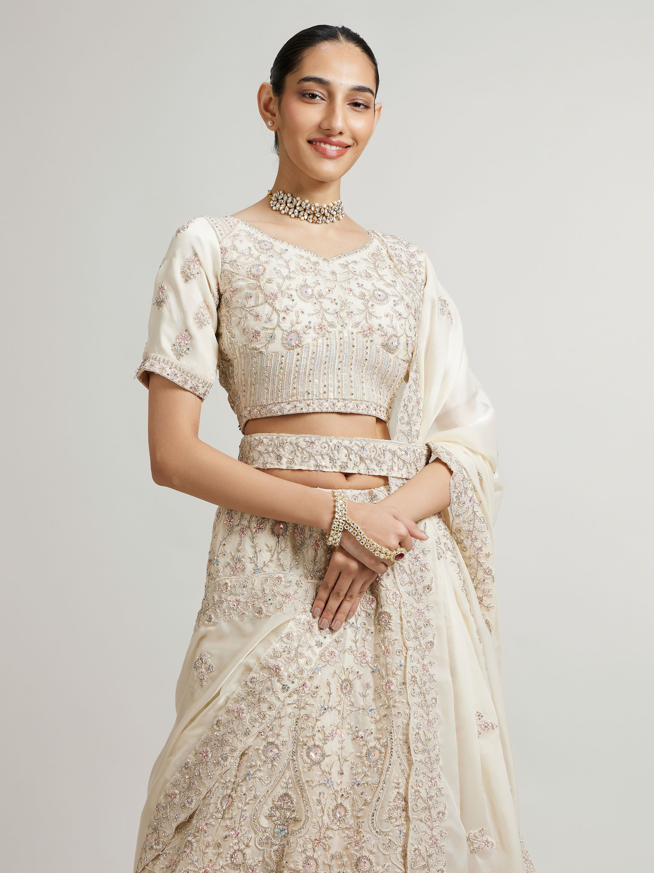 Mohey Women Cream White Paisley Lehenga with Sequin Work And Scalloped Hem