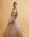 alt message - Mohey Women Ivory Cream Floral Stone Embellished Lehenga image number 1