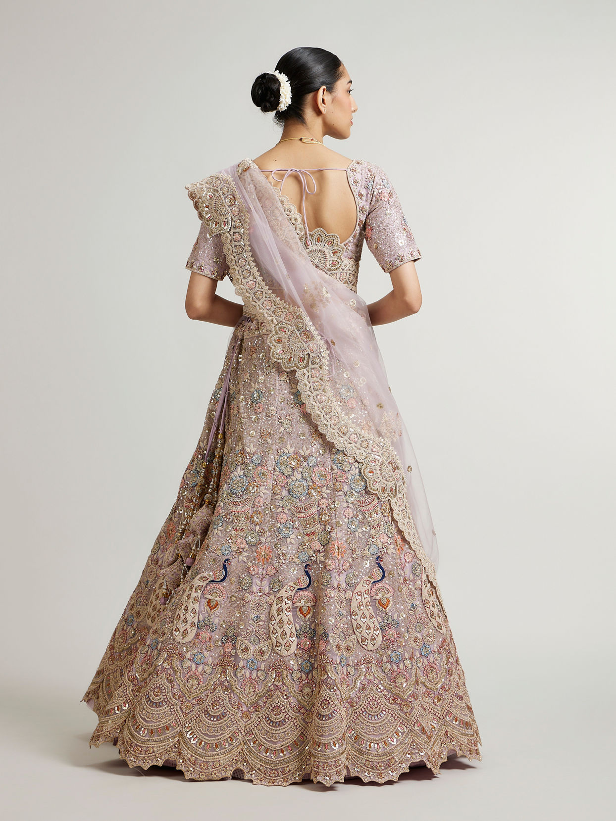 Mohey Women Mauve Purple Floral Lehenga with Peacock Motifs And Aari Embroidery