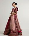 Mohey Women Maroon Red Bridal Aari Embroidered Lehenga with Imperial And Jaali Motifs