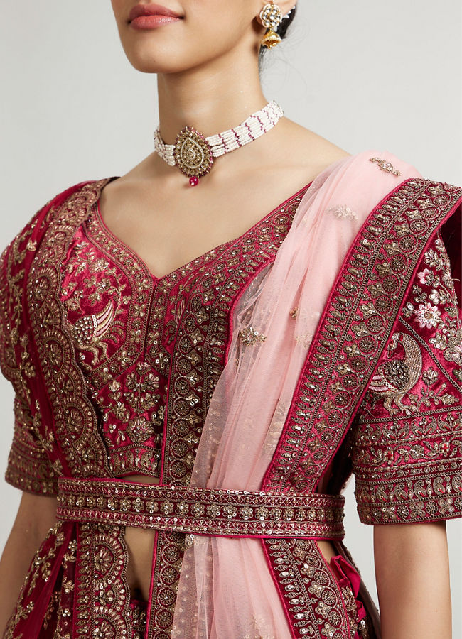 Mohey Women Maroon Red Bridal Aari Embroidered Lehenga with Imperial And Jaali Motifs