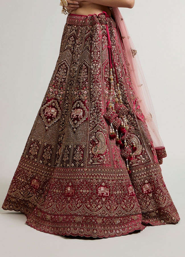 Mohey Women Maroon Red Bridal Aari Embroidered Lehenga with Imperial And Jaali Motifs