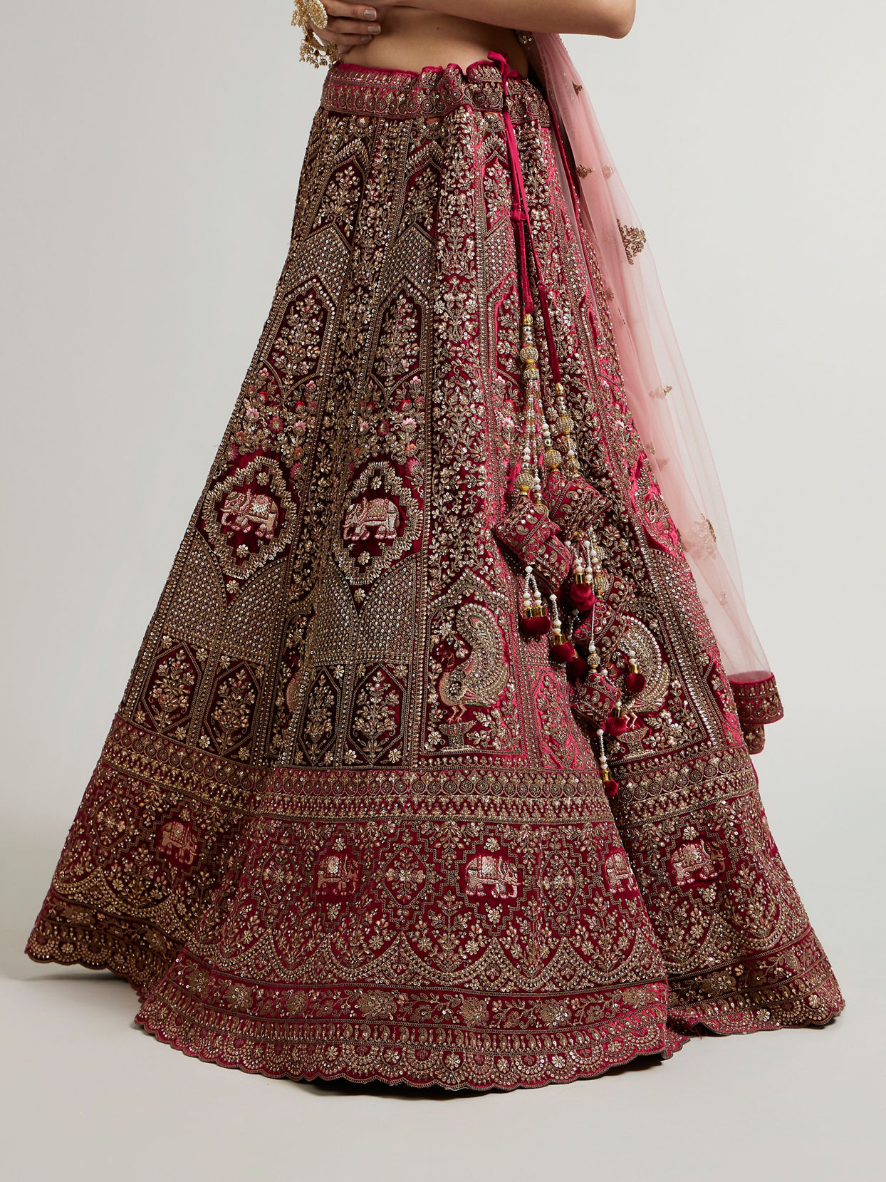 Mohey Women Maroon Red Bridal Aari Embroidered Lehenga with Imperial And Jaali Motifs