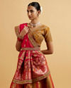 alt message - Mohey Women Orange and Pink Aari Embroidered Benarasi Lehenga image number 1