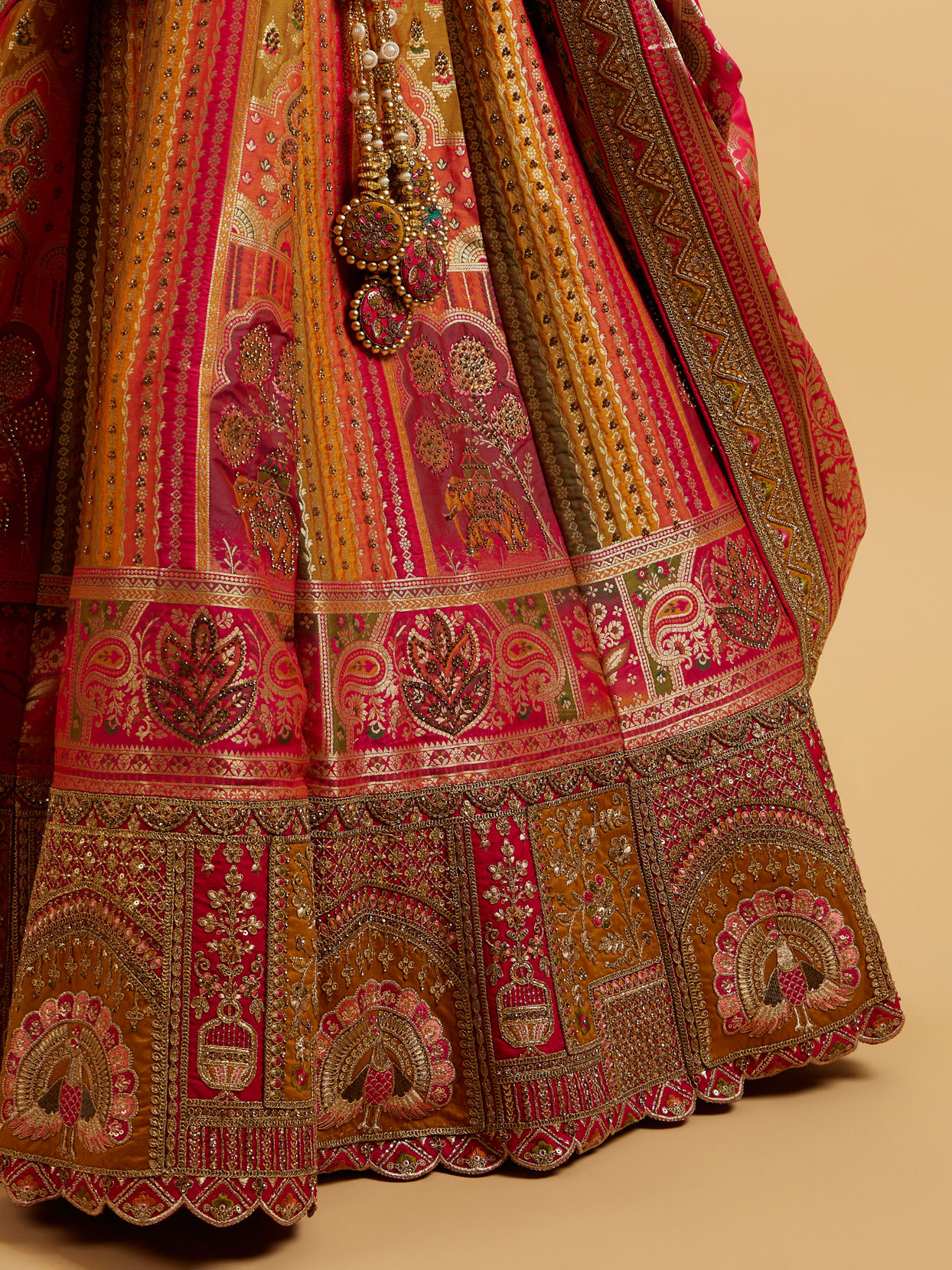 alt message - Mohey Women Orange and Pink Aari Embroidered Benarasi Lehenga image number 3