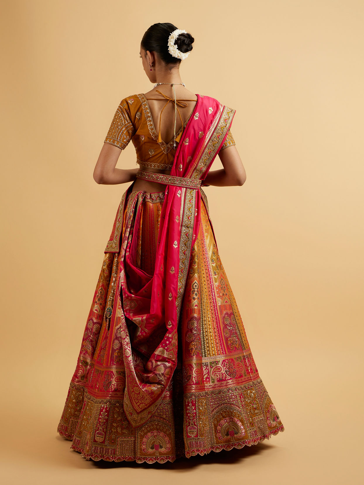 alt message - Mohey Women Orange and Pink Aari Embroidered Benarasi Lehenga image number 4