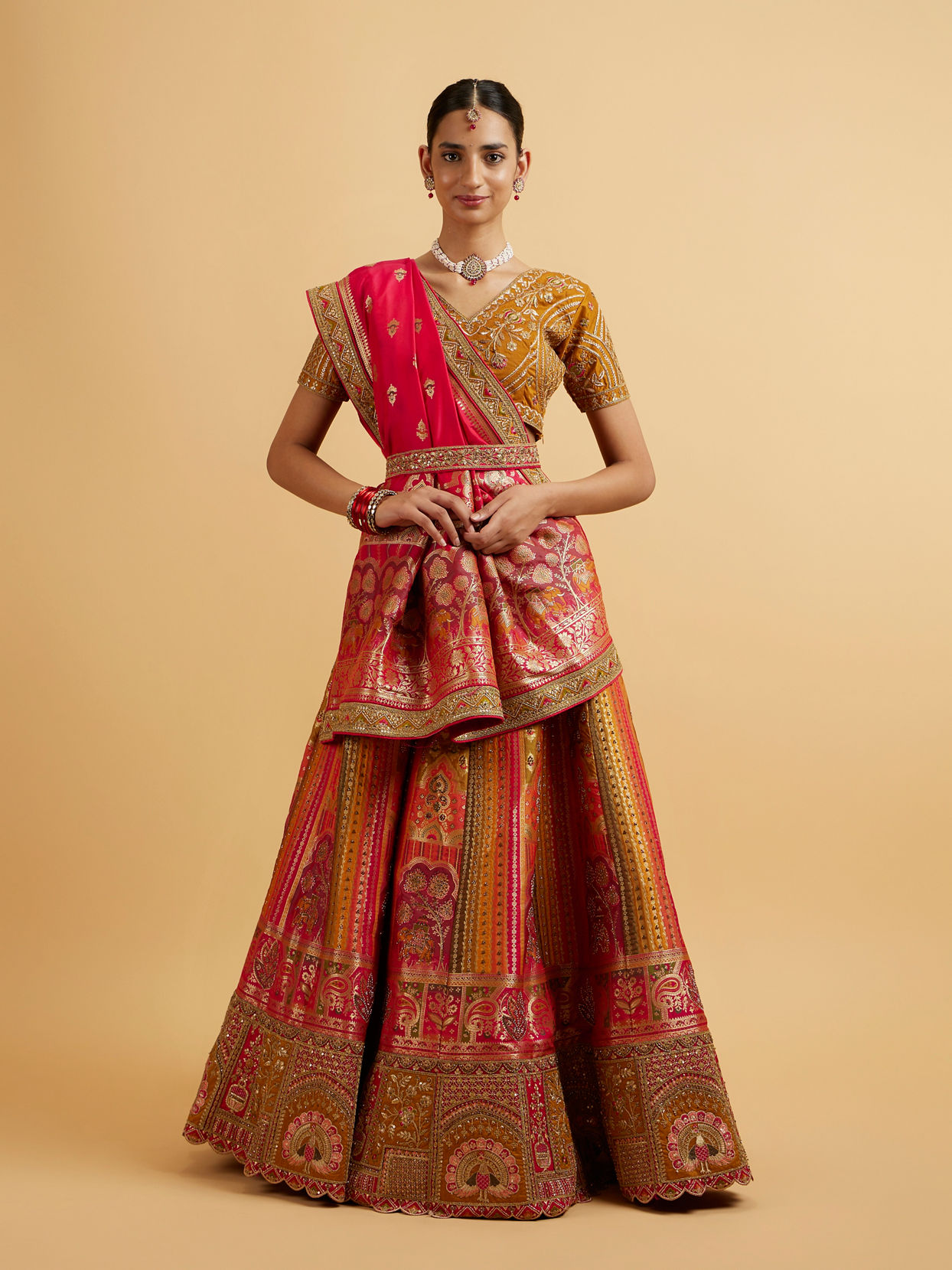 alt message - Mohey Women Orange and Pink Aari Embroidered Benarasi Lehenga image number 0