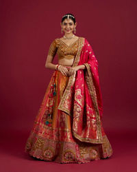 Mohey Women Orange and Pink Aari Embroidered Benarasi Lehenga