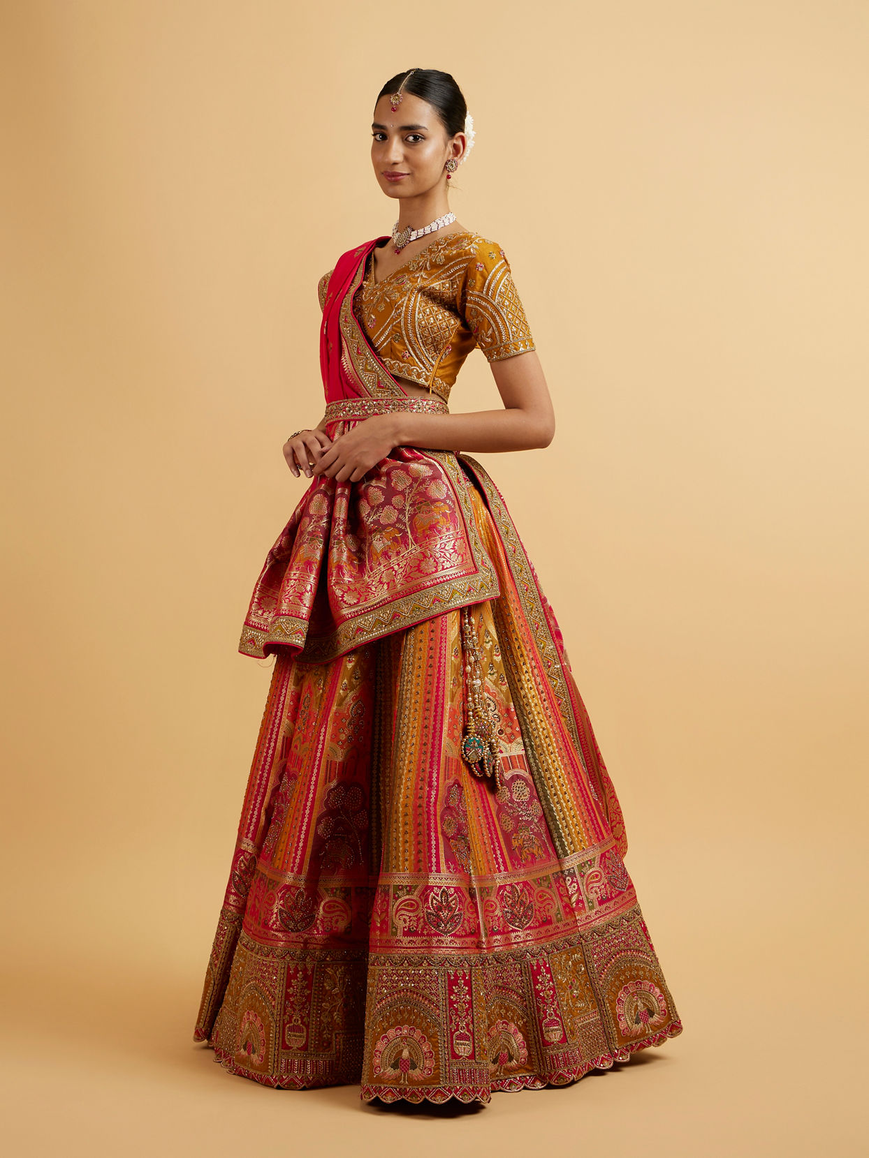 alt message - Mohey Women Orange and Pink Aari Embroidered Benarasi Lehenga image number 2