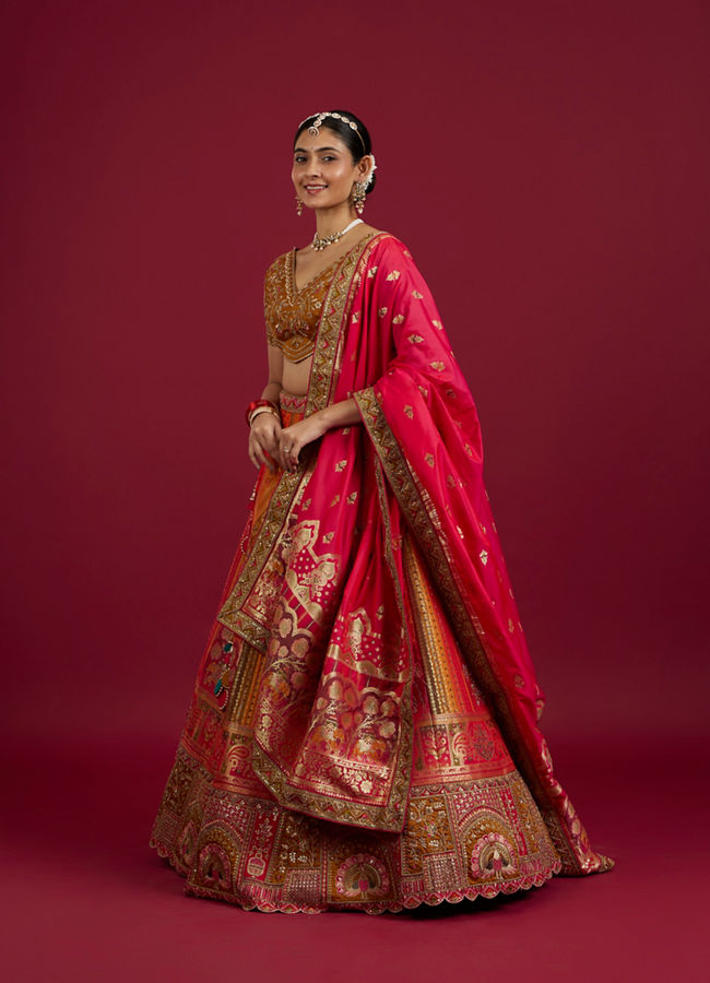 Mohey Women Orange and Pink Aari Embroidered Benarasi Lehenga