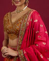 Mohey Women Orange and Pink Aari Embroidered Benarasi Lehenga