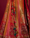 Mohey Women Orange and Pink Aari Embroidered Benarasi Lehenga