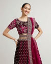 Mohey Women Dark Wine Bel Buti Patterned Bridal Lehenga with Aari Embroidery image number 1