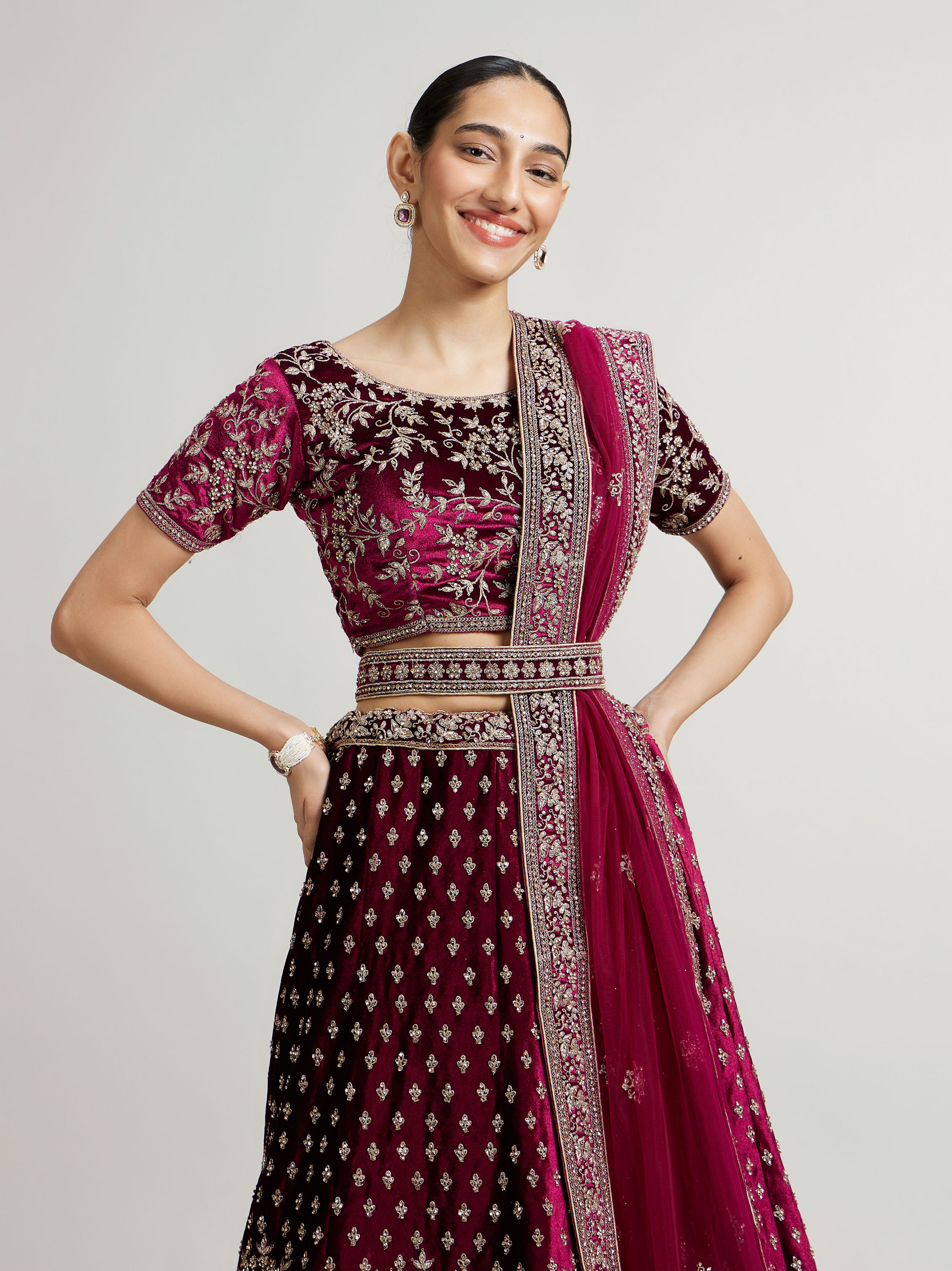 Mohey Women Dark Wine Bel Buti Patterned Lehenga with Aari Embroidery