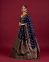 Mohey Women Rama Green Paisley Patterned Benarasi Lehenga with Buta Patterned