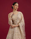 Mohey Women Soft Cream Rhinestone Embellished Lehenga with Teardrop, Fern And Jaal Patterns
