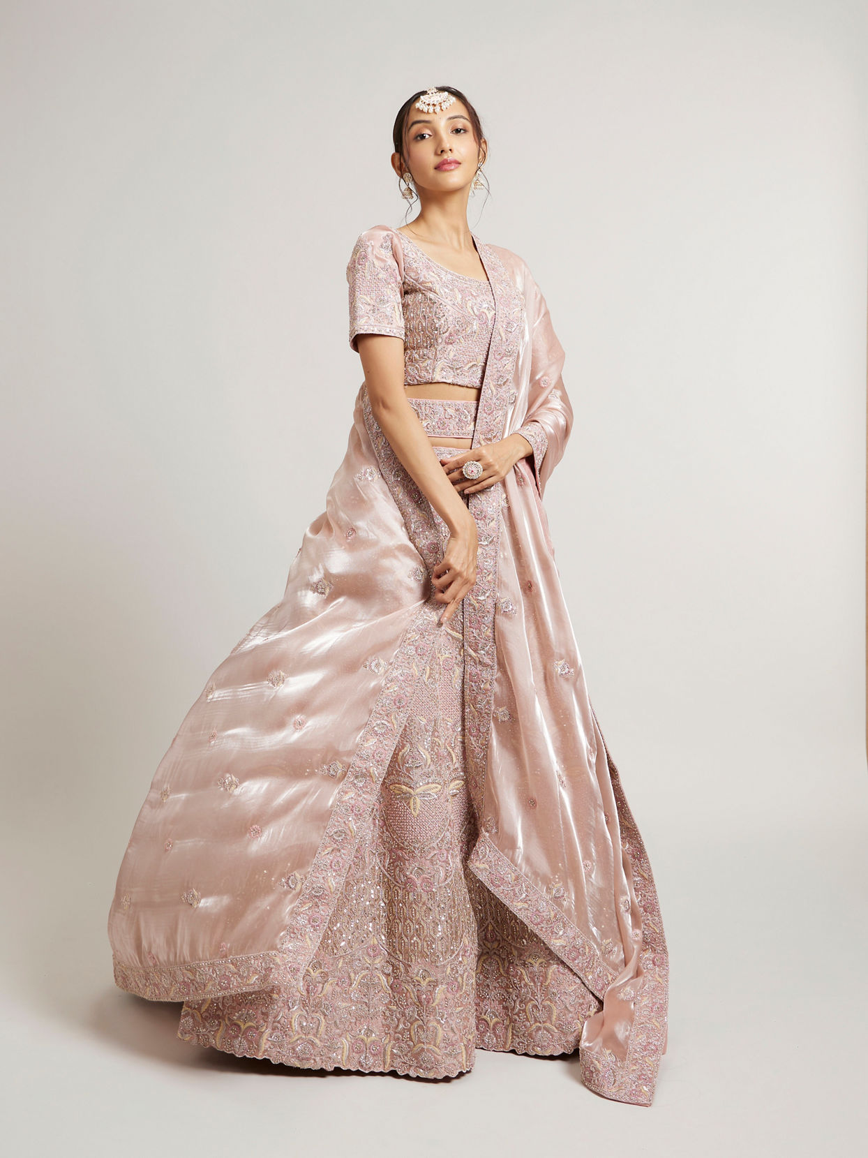Mohey Women Blush Pink Lehenga with Imperial Motifs And Sequin Work And Potli Trims