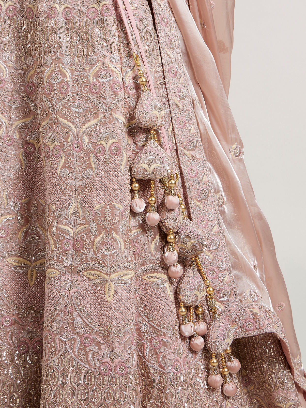 Mohey Women Blush Pink Lehenga with Imperial Motifs And Sequin Work And Potli Trims