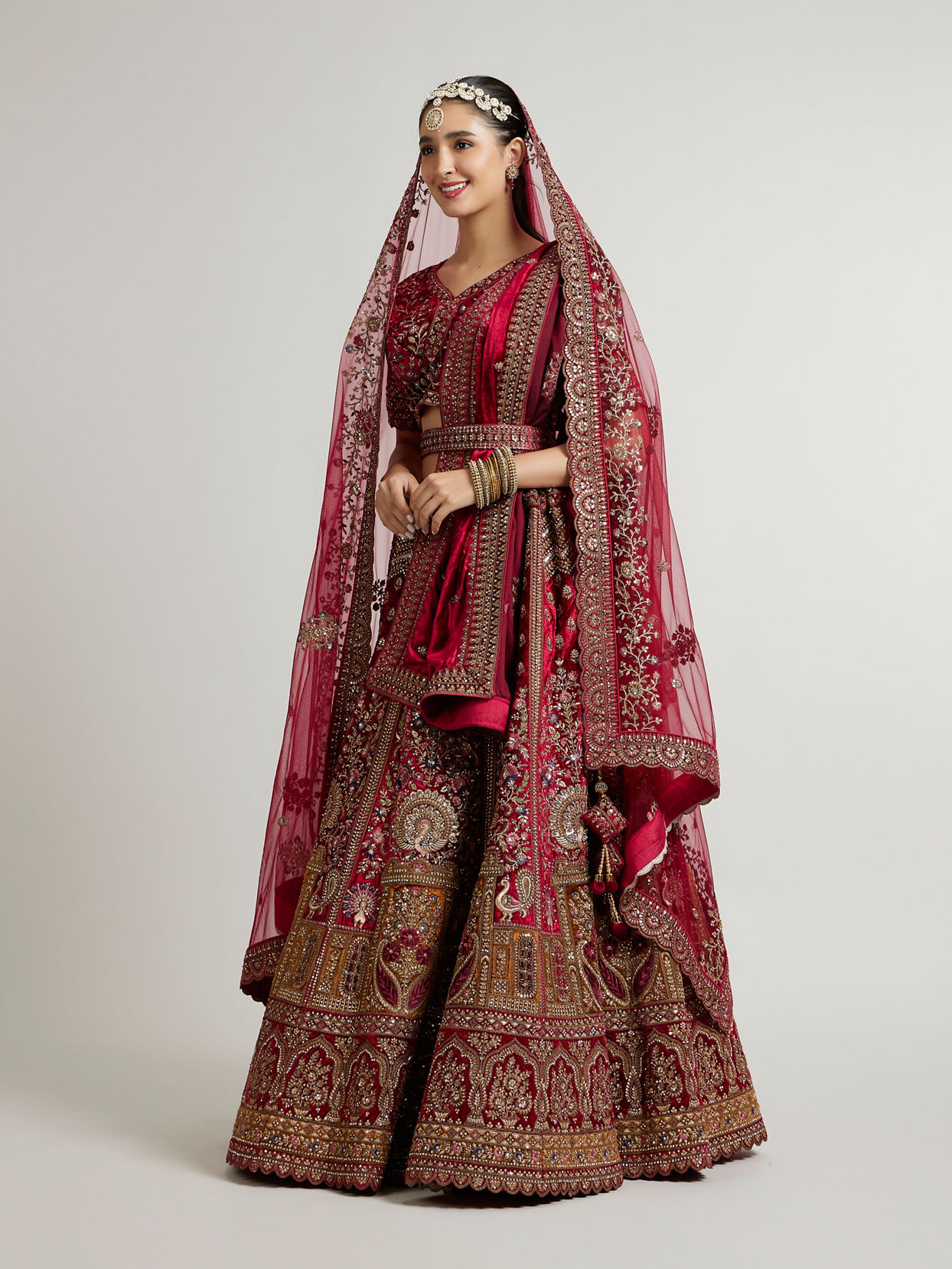 Mohey Women Maroon Red Aari Embroidered Lehenga with Peacock And Floral Motifs