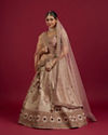 Mohey Women Soft Cream Linear Patterned Lehenga with Rhinestone And Sequin Work