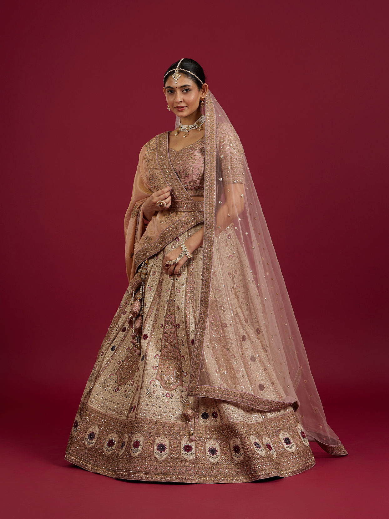 Mohey Women Soft Cream Linear Patterned Lehenga with Rhinestone And Sequin Work