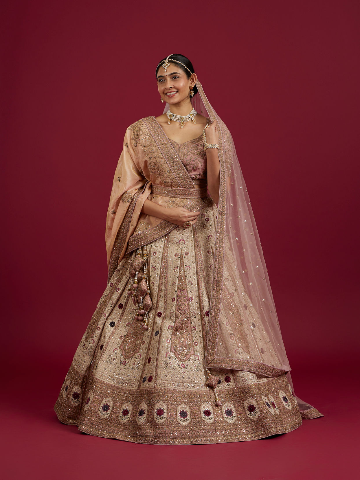 Mohey Women Soft Cream Linear Patterned Lehenga with Rhinestone And Sequin Work
