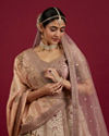 Mohey Women Soft Cream Linear Patterned Lehenga with Rhinestone And Sequin Work