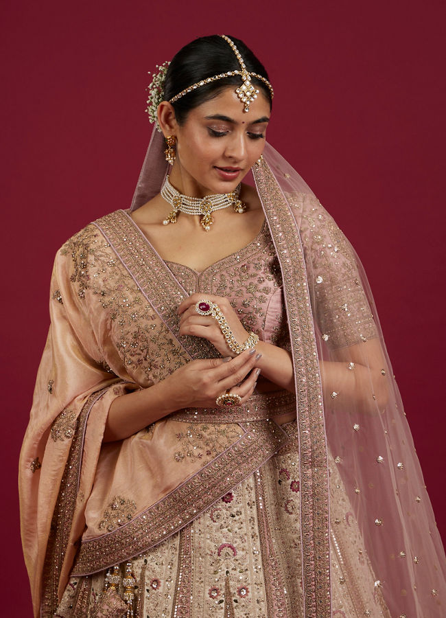 Mohey Women Soft Cream Linear Patterned Lehenga with Rhinestone And Sequin Work