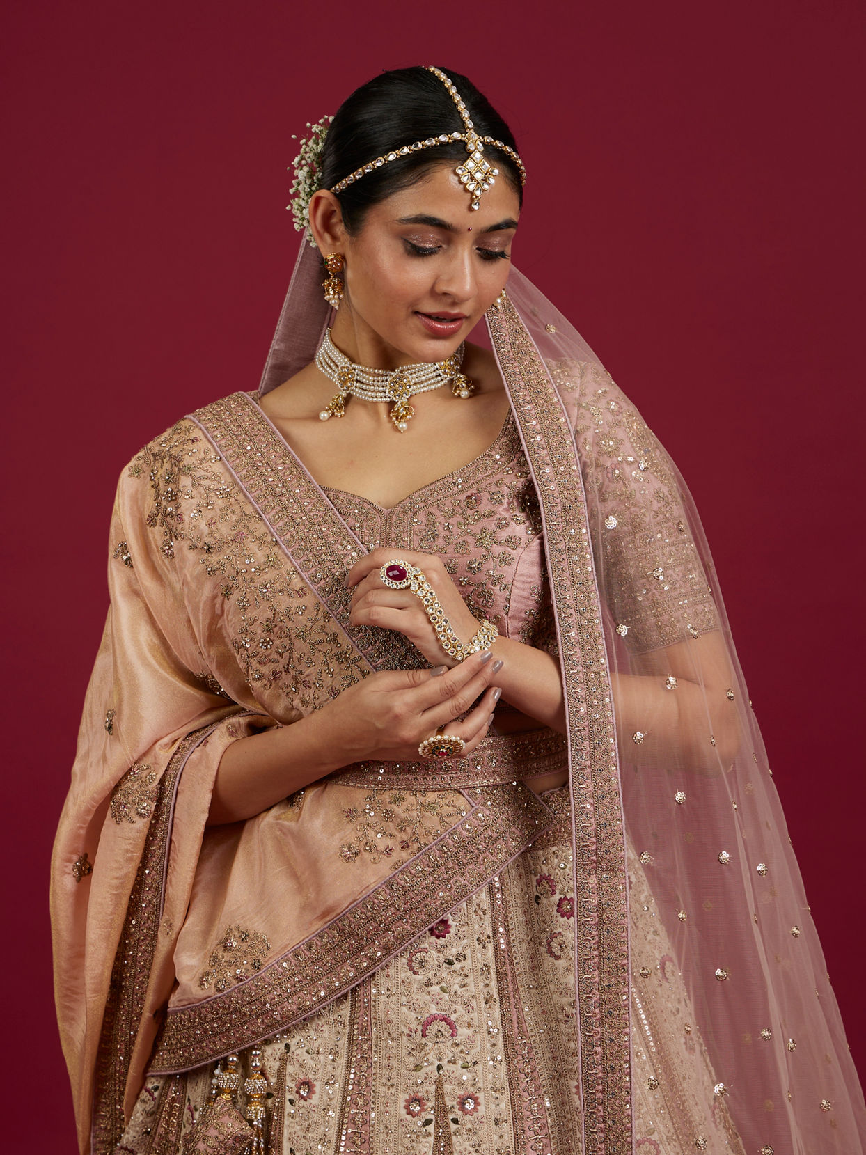 Mohey Women Soft Cream Linear Patterned Lehenga with Rhinestone And Sequin Work