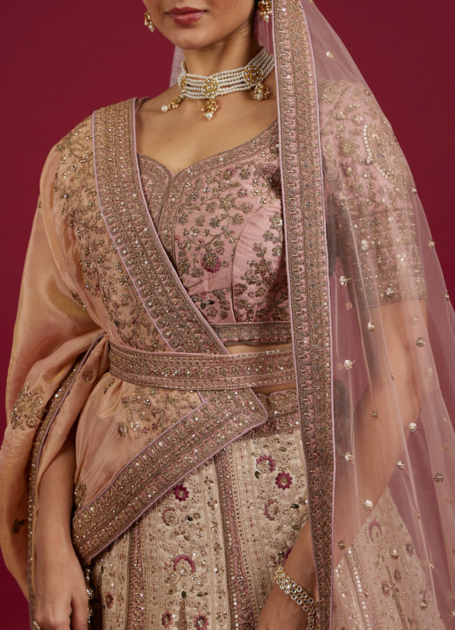 Mohey Women Soft Cream Linear Patterned Lehenga with Rhinestone And Sequin Work