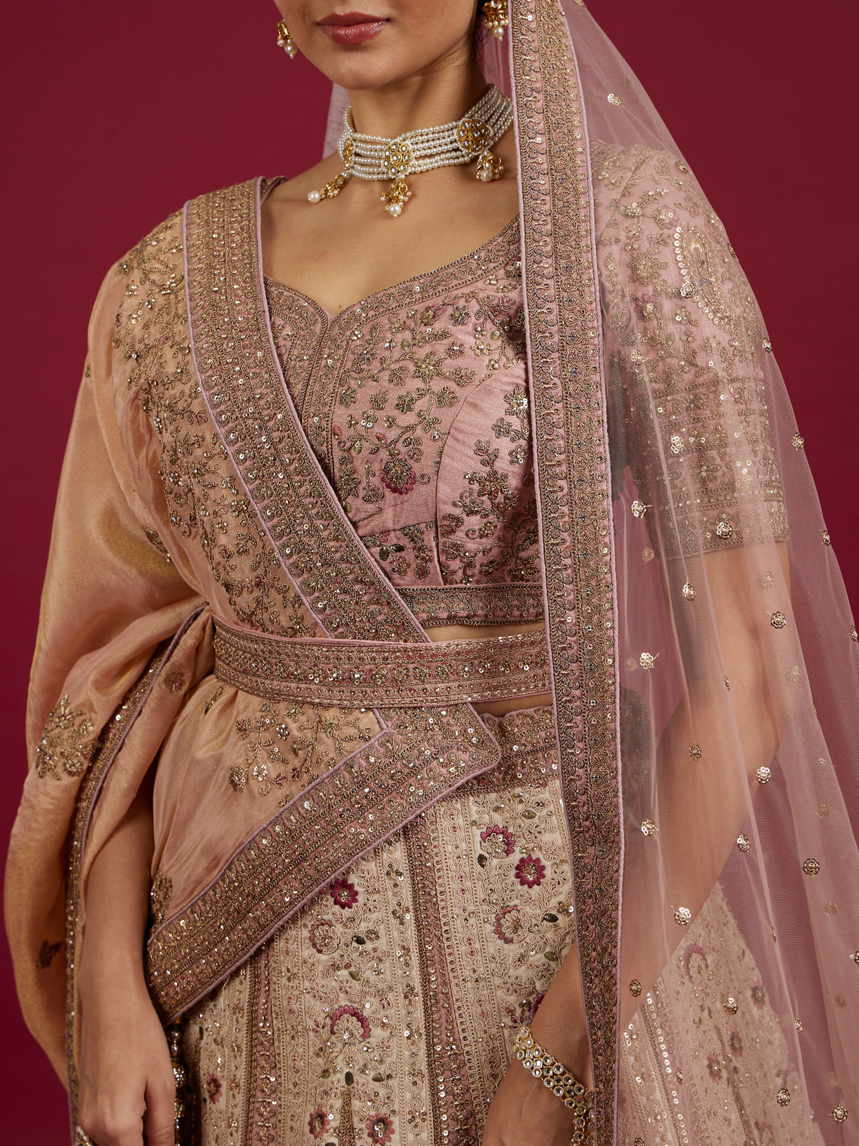 Mohey Women Soft Cream Linear Patterned Lehenga with Rhinestone And Sequin Work
